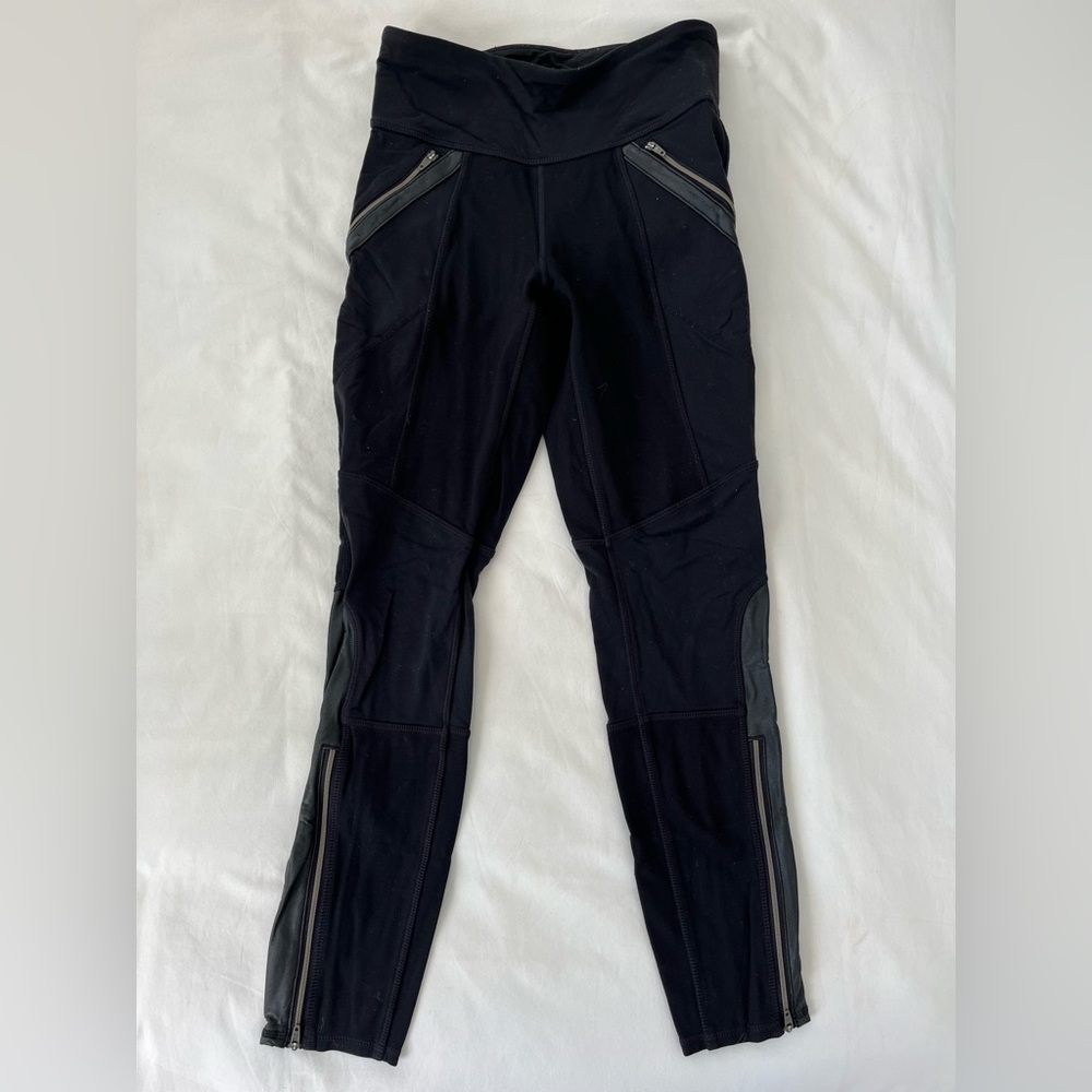 Black Athleta Leggings with Leather and Zipper Design